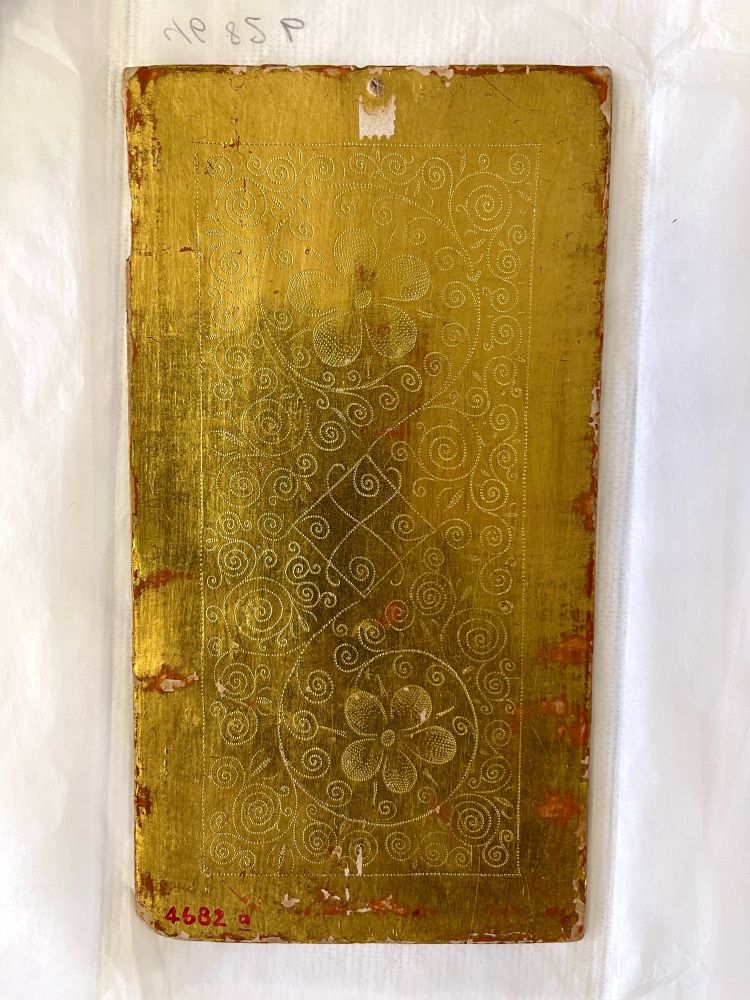 Ornamental design on the back of the Page of Swords card