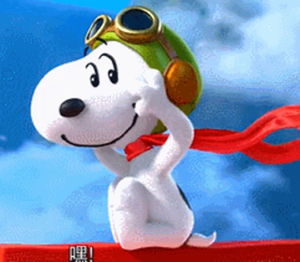 snoopy wearing headphones and goggles is sitting on a red item