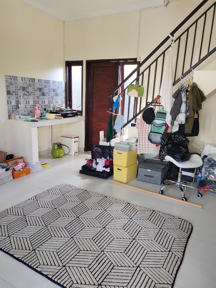 picture of house interior with many things lying around