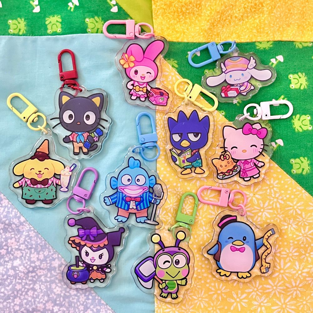a photo of several hello kitty island adventure inspired keychains