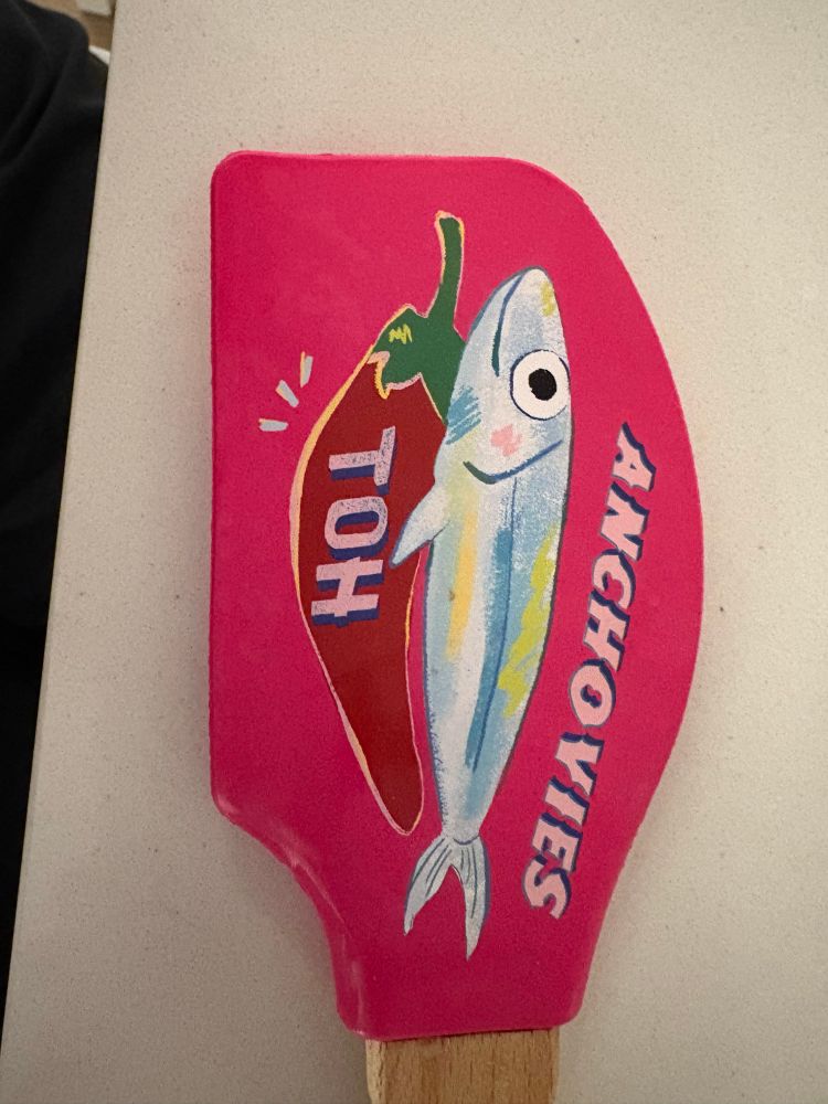 reverse side of spatula reading for some reason “ANCHOVIES TOH”