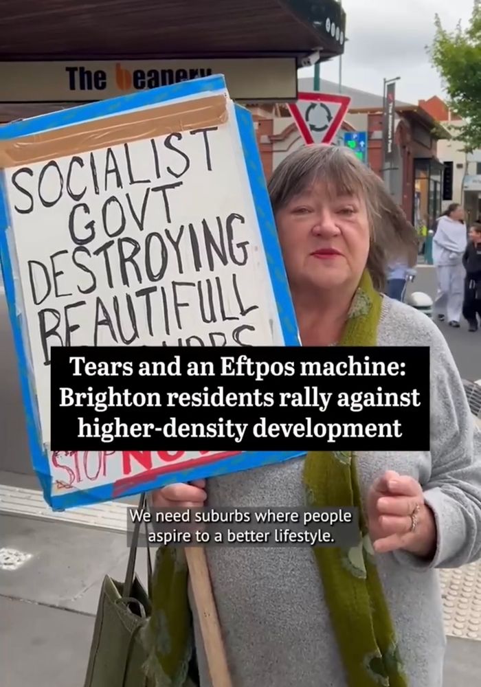 Hyacinth Bucket with a sign decrying 'Socialist Govt Destroying Beautiful Suburbs' talking the reporter 'we need suburbs where people aspire to a better lifestyle'