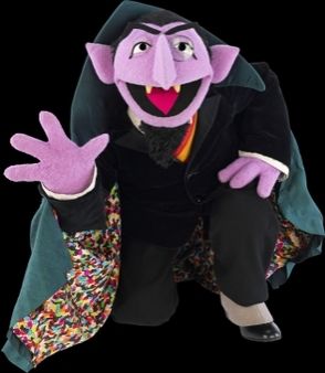 The count from Sesame Street holds up his counting digits!!