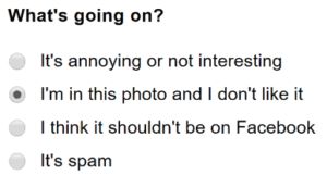 Text: "what's going on?" followed by the options: it's annoying or not interesting; i'm in this photo and i don't like it; i think it shouldn't be on facebook; it's spam
