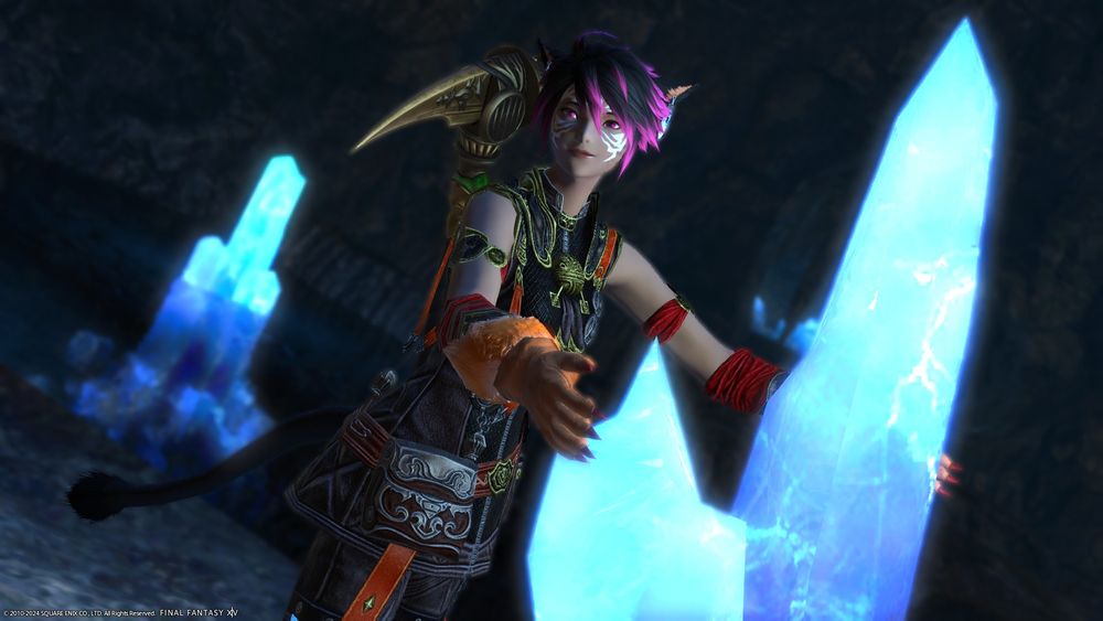 A female miqo'te in mining gear happy as she show the shiny blue crystal she found to the camera