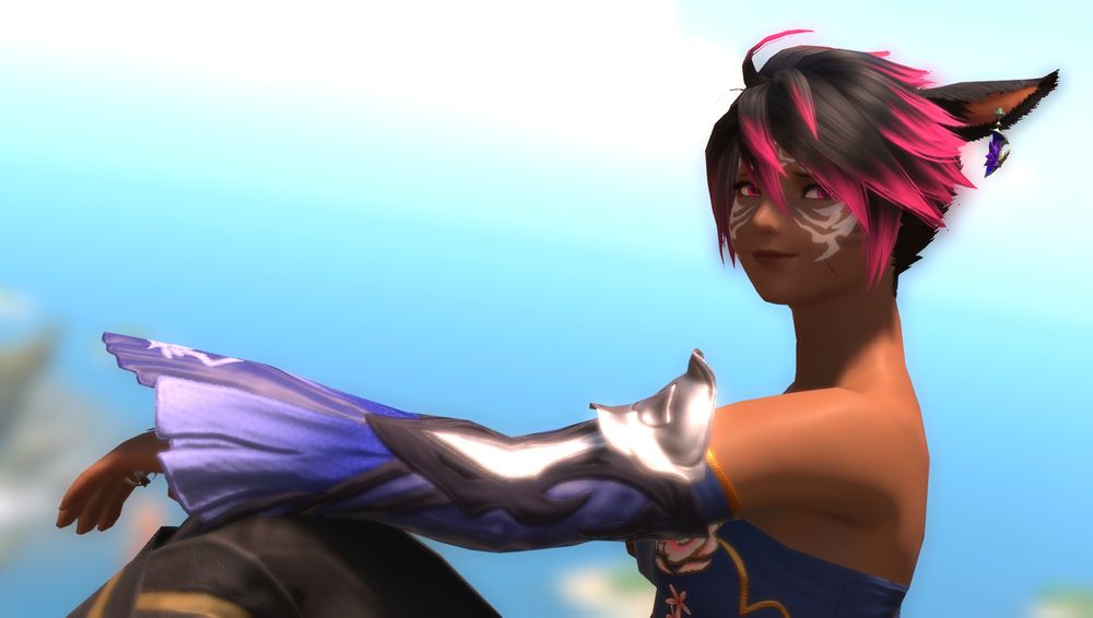 A screenshot from the game FFXIV, featuring my character Shee. She has black hair with pink bangs, with long catlike ears. She has tattoos on her face with white ink and pink eyes, she is smiling sweetly to the viewer. She wears a blue top and a sleeve that covers most of her arm, leaving her neck and shoulders naked. She has a scar on her chin.