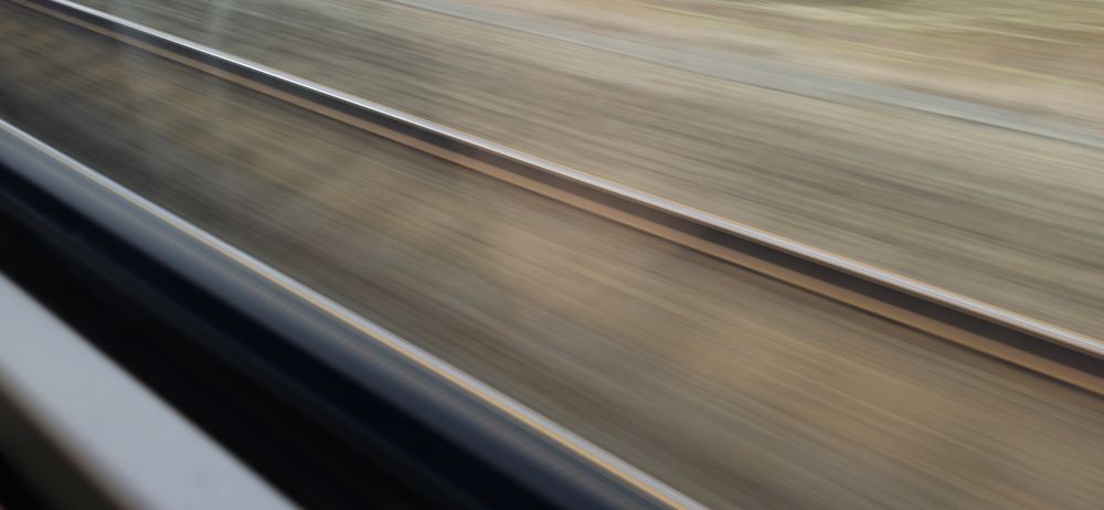 Long(ish) exposure Photo of train tracks whizzing by