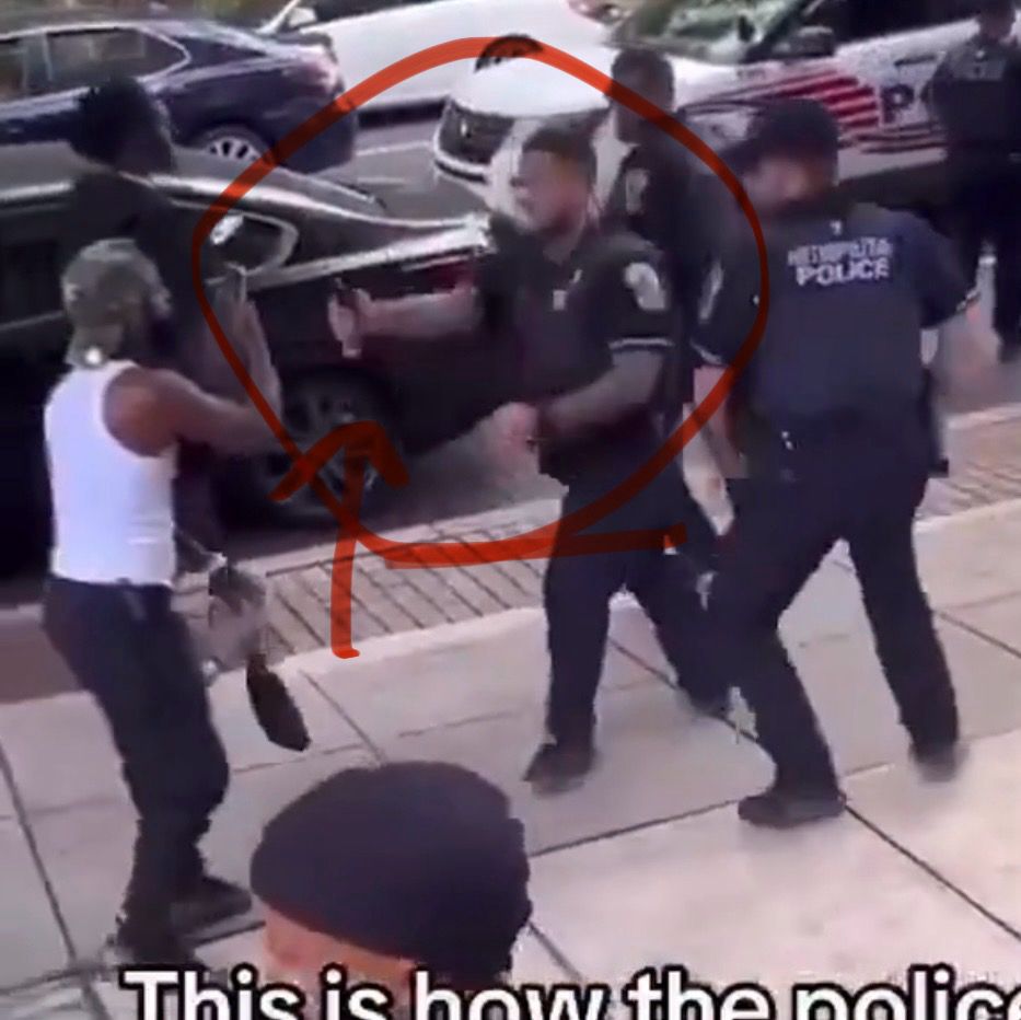 The moment a poorly trained law enforcement officer flips around and sprays a citizen seen filming the police for now apparent reason.