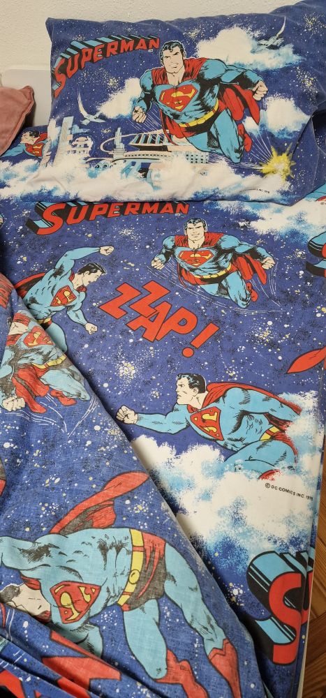 Superman printed bedsheets and pillow case with words "Zzap!" and "Superman"