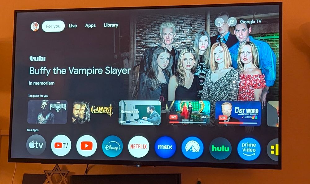 tubi (a service that runs on ads) running an ad for Buffy streaming with an "In Memoriam" tag 