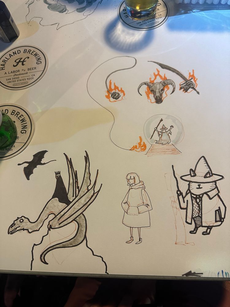 More doodles from the night: a nazgul, a cat-wizard, and a woman in a big rain coat