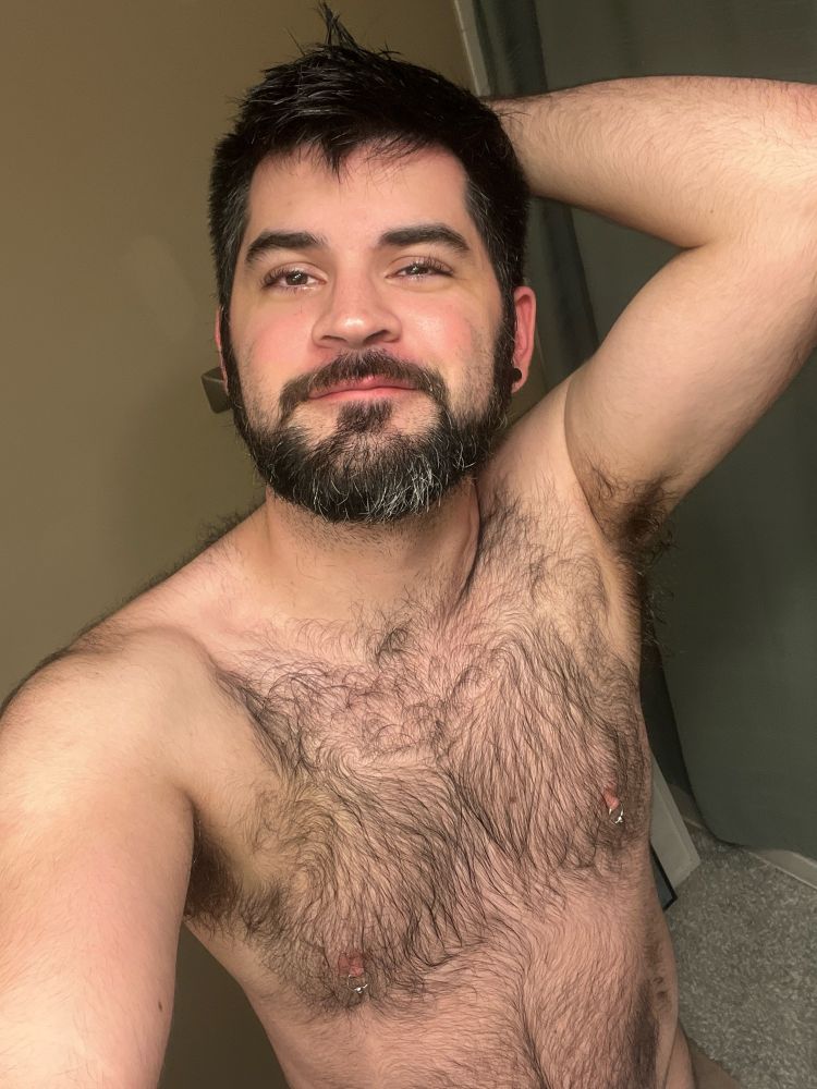 A selfie with my tummy showing, shirtless and freshly showered 