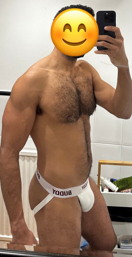 Guy stood in white buddy underwear jockstrap 