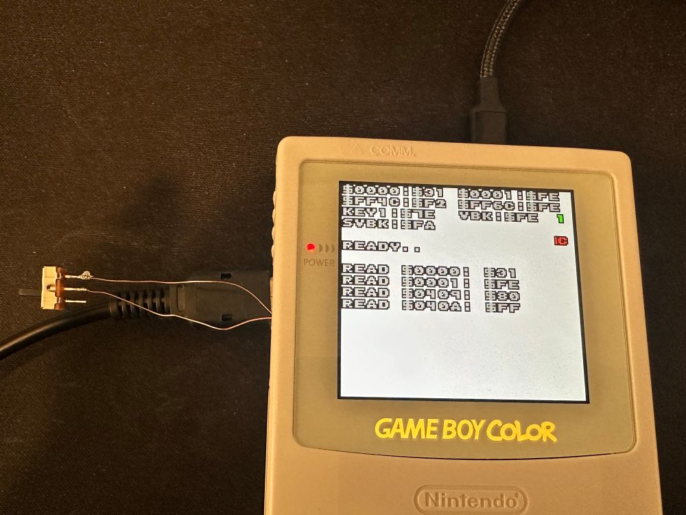 A photo of a Game Boy Color showing the boot ROM being read, including the 2 bytes that are different to other revisions.