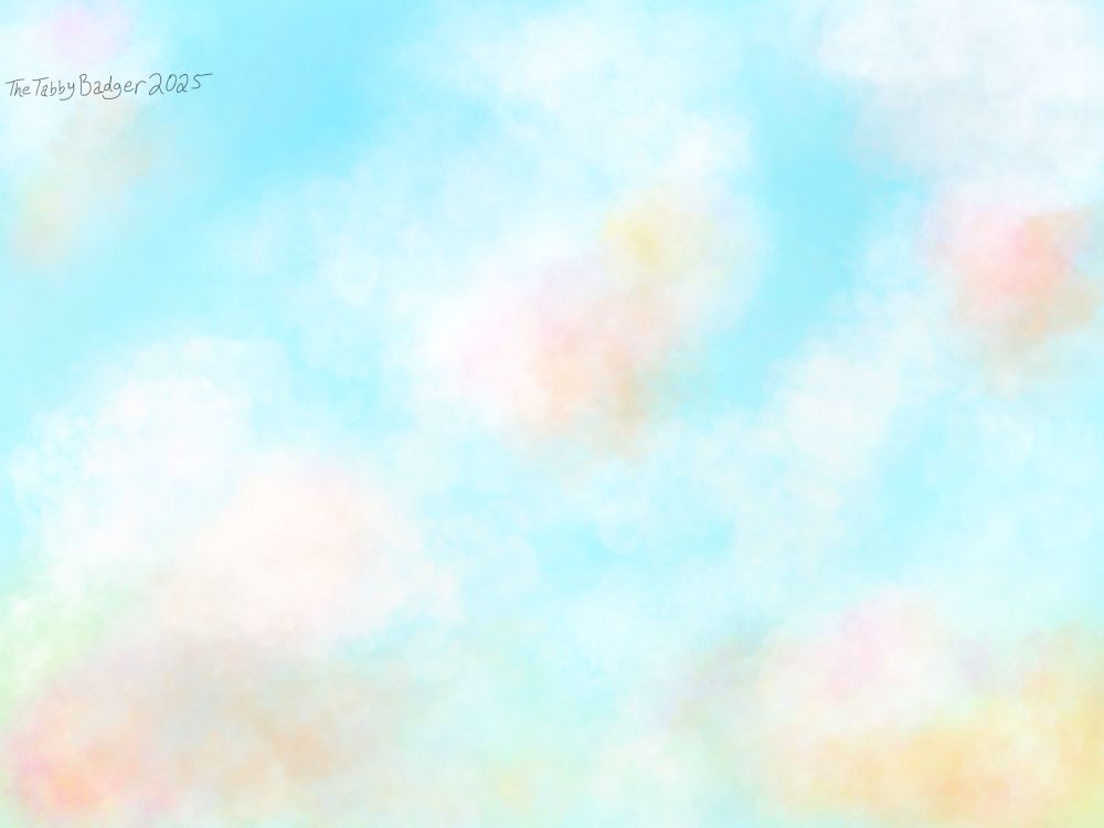 Clouds at sunrise with some yellow and pink hues.