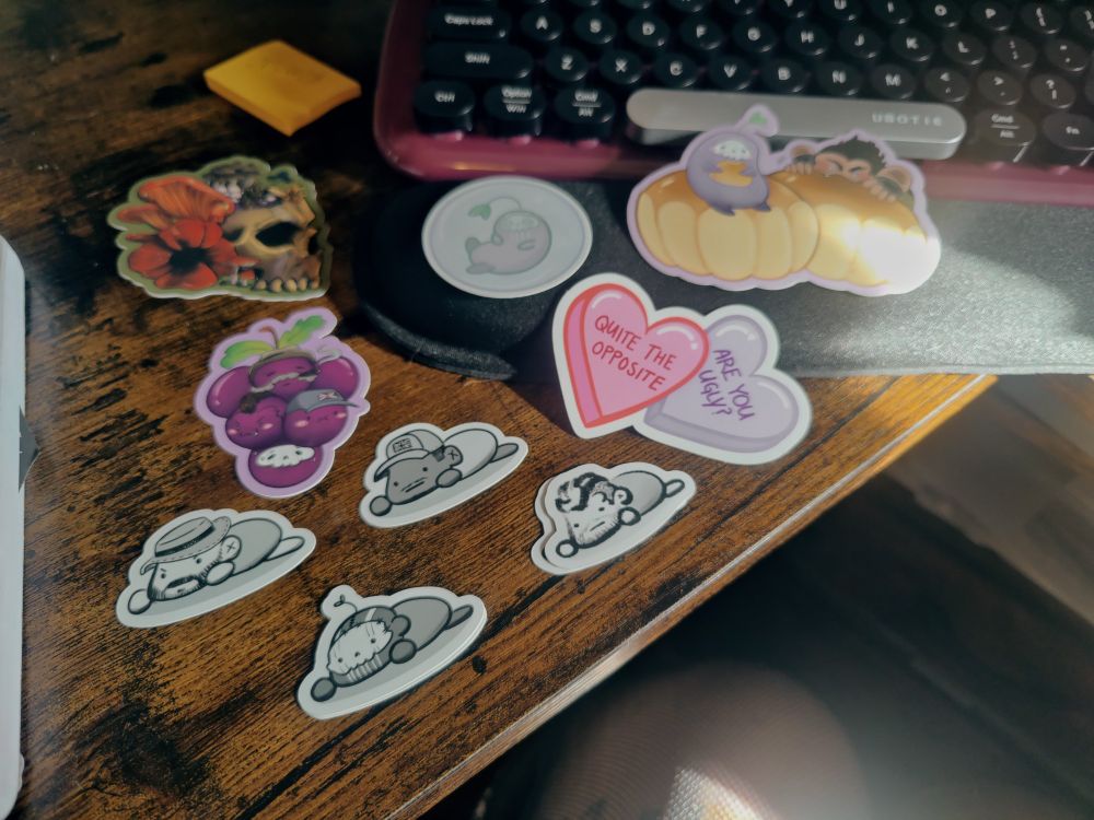 Several stickers on a desk