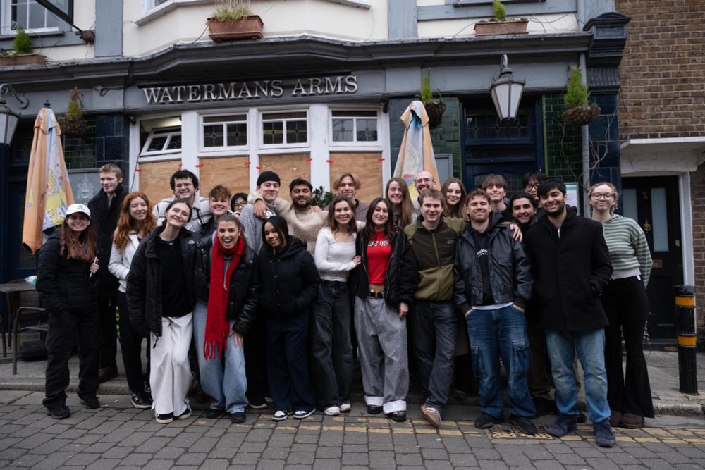 The crew of the MetFilm student long form production “The Golden Years” outside of one of their shooting locations the Waterman’s Arms pub in London. It’s the final day of shooting; they’re all smiling.