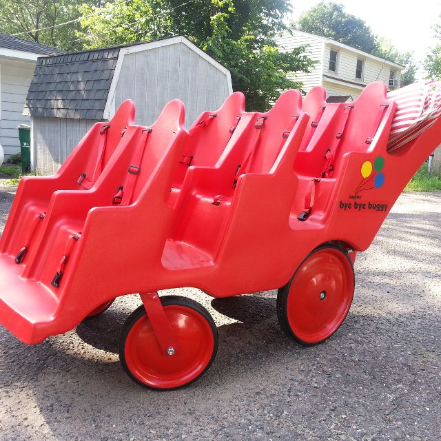 Red, plastic, 6-seat multi-stroller for preschool classes