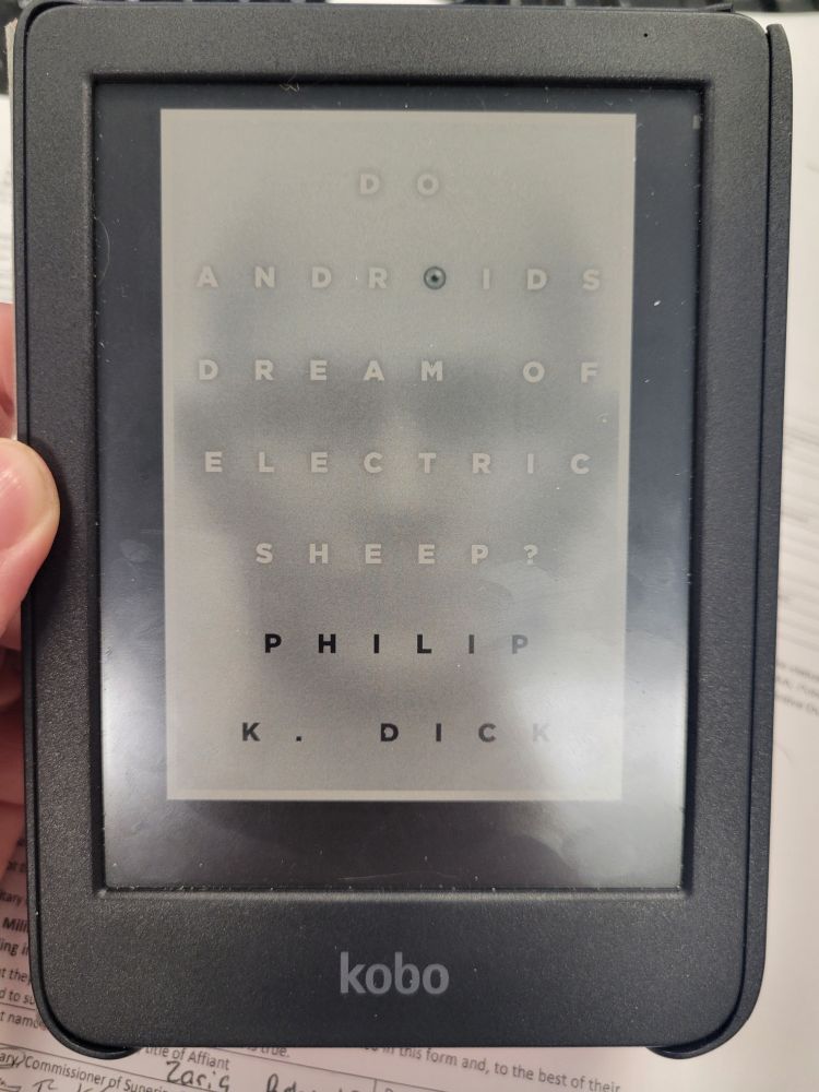 a Kobo e-reader showing an ebook of Do Androids Dream of Electric Sheep by Phillip K. Dick