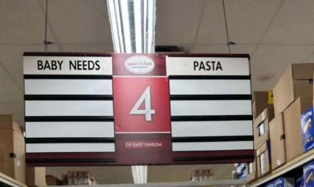 baby needs pasta grocery store sign