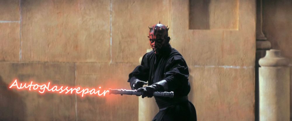 Darth Maul, in the infamous scene in 'The Phantom Menace', engaging the first part of his double-ended Lightsaber which reads 'Autoglass repair'