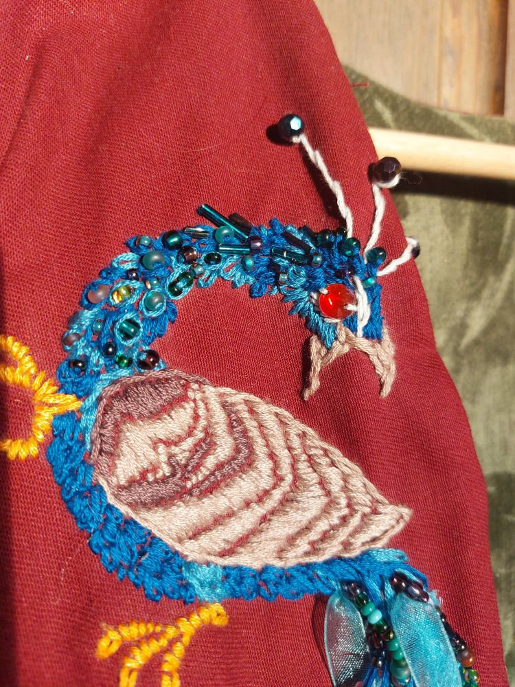 Detail of peacock embroidery