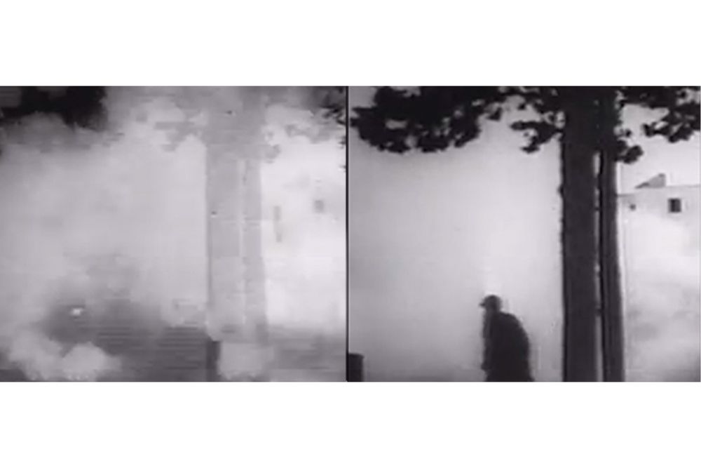 a man walking in the fog