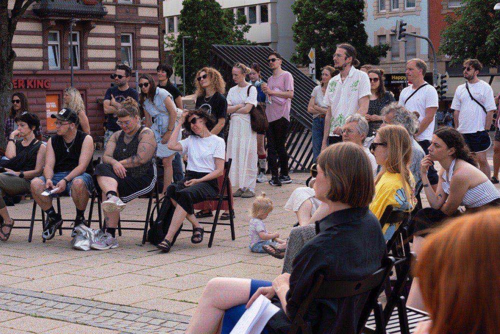 a group of people sitting in chairs