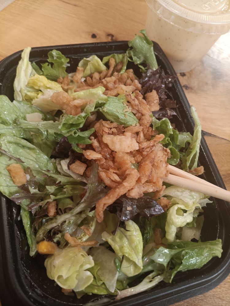 Is food.
Leafs and uh... sauce and uh crunchy onions and a few corns and oh PARMESAN and uh chompstix to eatit wif