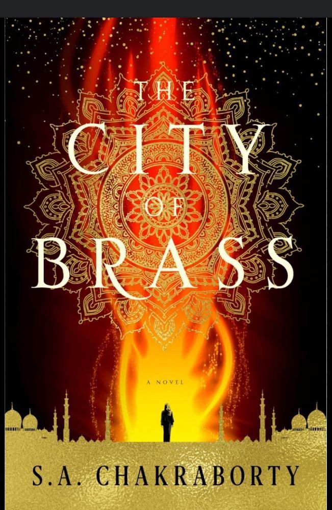 Title: The City of Brass, by S. A. Chakraborty. Background image is of a good mandala overlaid with a tall, vertical flame. At the bottom is a gold skyline, with a small human figure standing in the centre 