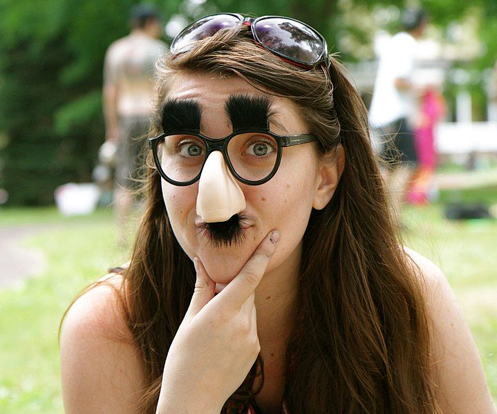 Woman wearing groucho marx glasses
