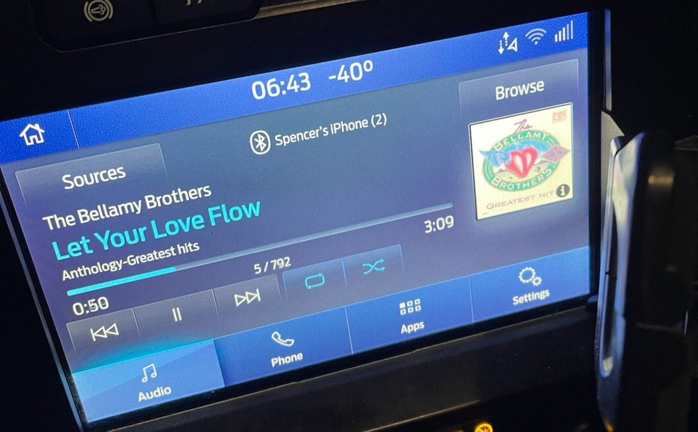 Image is a picture of the dash console of a vehicle that displays the temperature as -40 degrees.