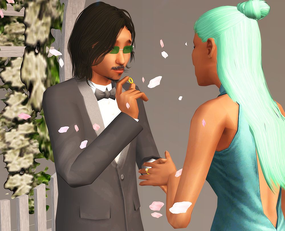 Screenshot of a male and female sim getting married