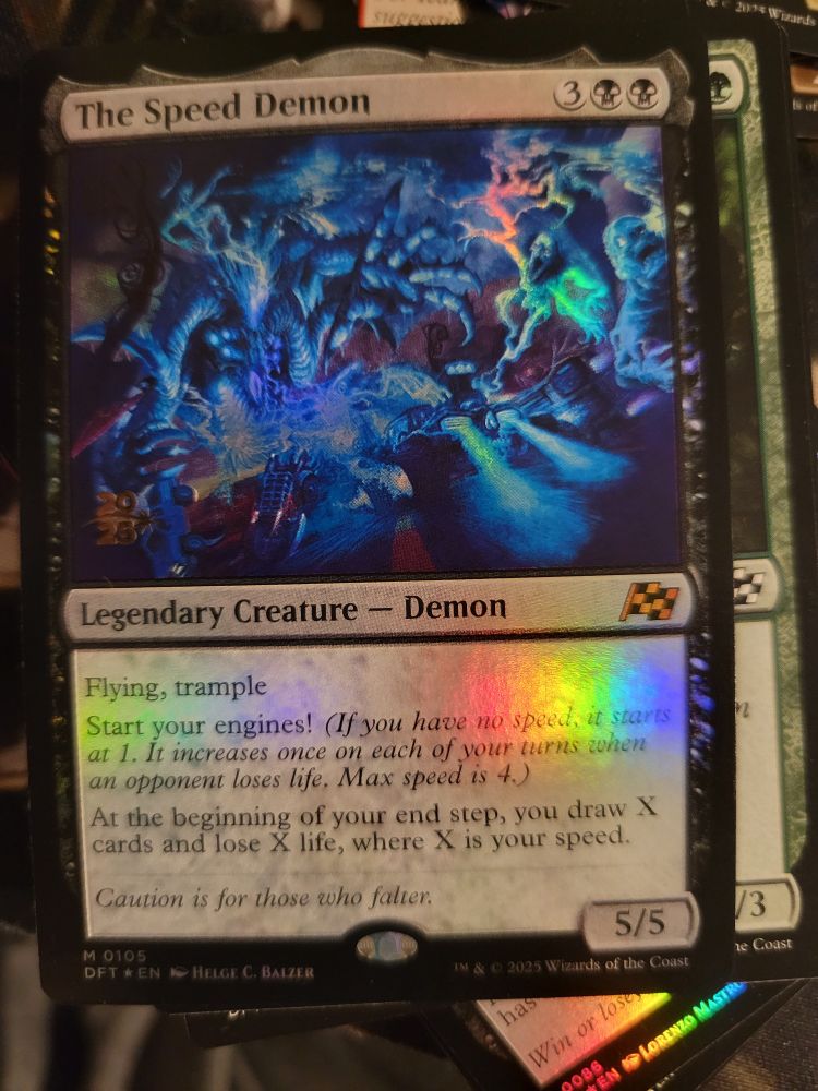 A photo of a Prerelease Promo "The Speed Demon" from Magic: the Gathering Aetherdrift.  It is a 3BB Legendary Flying Trample Demon with "Start your Engines!" and "At the beginning of your end step, you draw X cards and lose X life, where X is your speed."