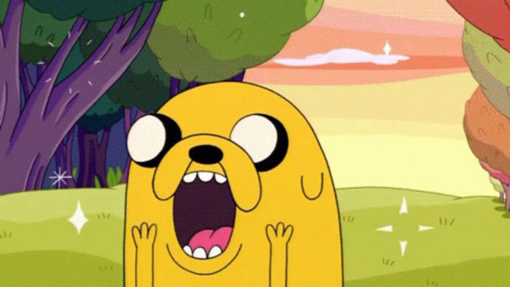 a cartoon character named jake the dog with his mouth open