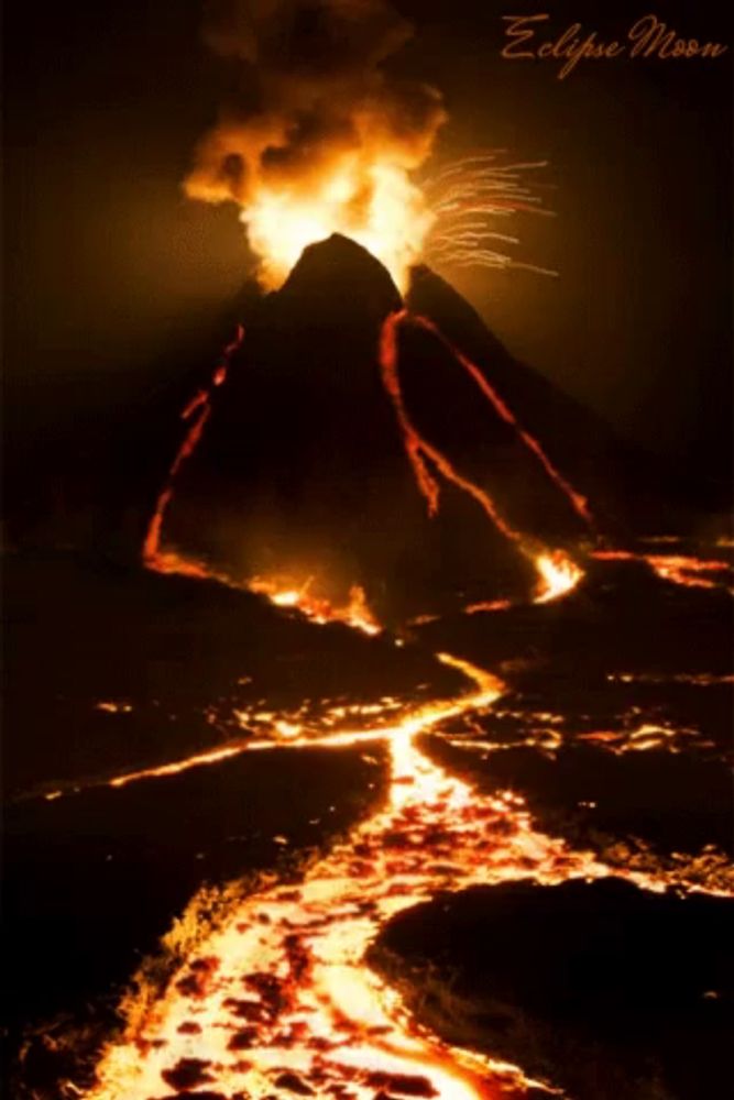 a picture of an erupting volcano with the words eclipse moon written on the bottom