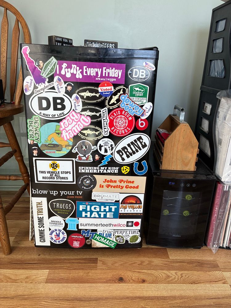 Mini-refrigerator covered with stickers