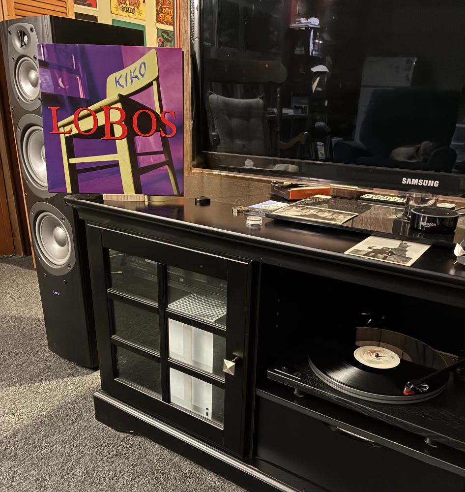 https://www.discogs.com/release/29008663-Los-Lobos-Kiko

Record playing on a U-Turn Orbit Theory turntable w/Ortofon 2M Bronze cartridge. The album jacket is displayed on entertainment center.