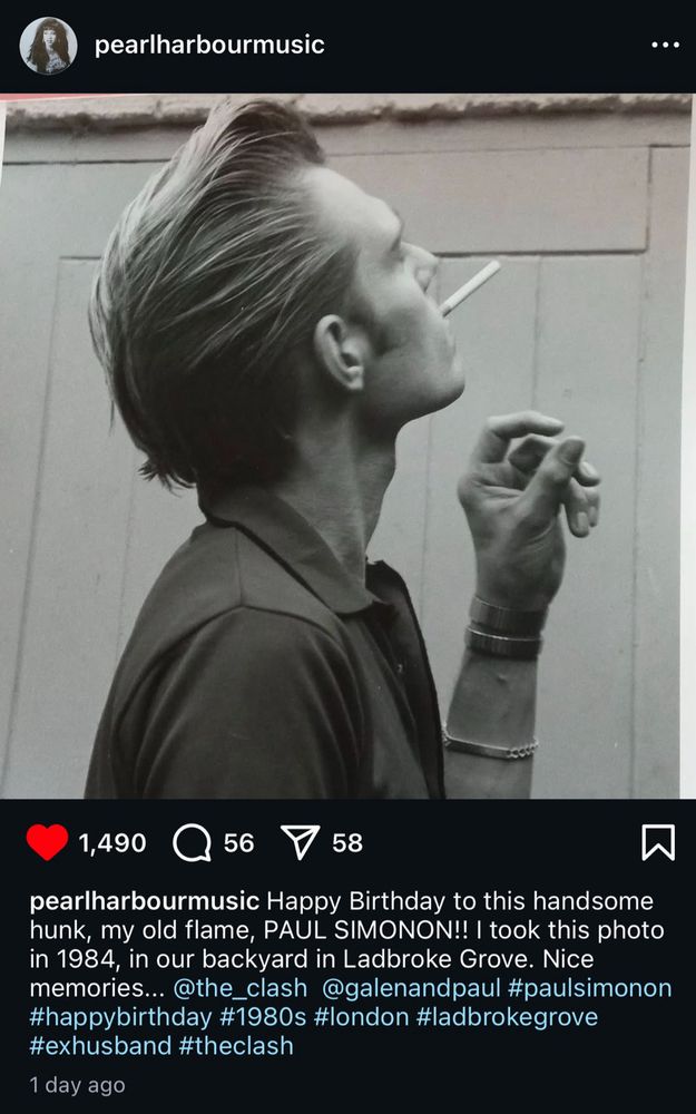 Screen shot from Pearl Gates of Pearl Harbour and the Explosions. It is a picture of her Ex-Husband Paul Simonon smoking a cigarette and looking off into the distance. He is hot. Caption says “Happy Birthday to this handsome hunk, my old flame, PAUL SIMONON!!! I took this photo in 1984, in our backyard in Ladbroke Grove. Nice memories…”