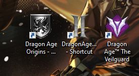 screenshot of a pc desktop showing the game icons for dragon age origins, dragon age 2, and dragon age the veilguard