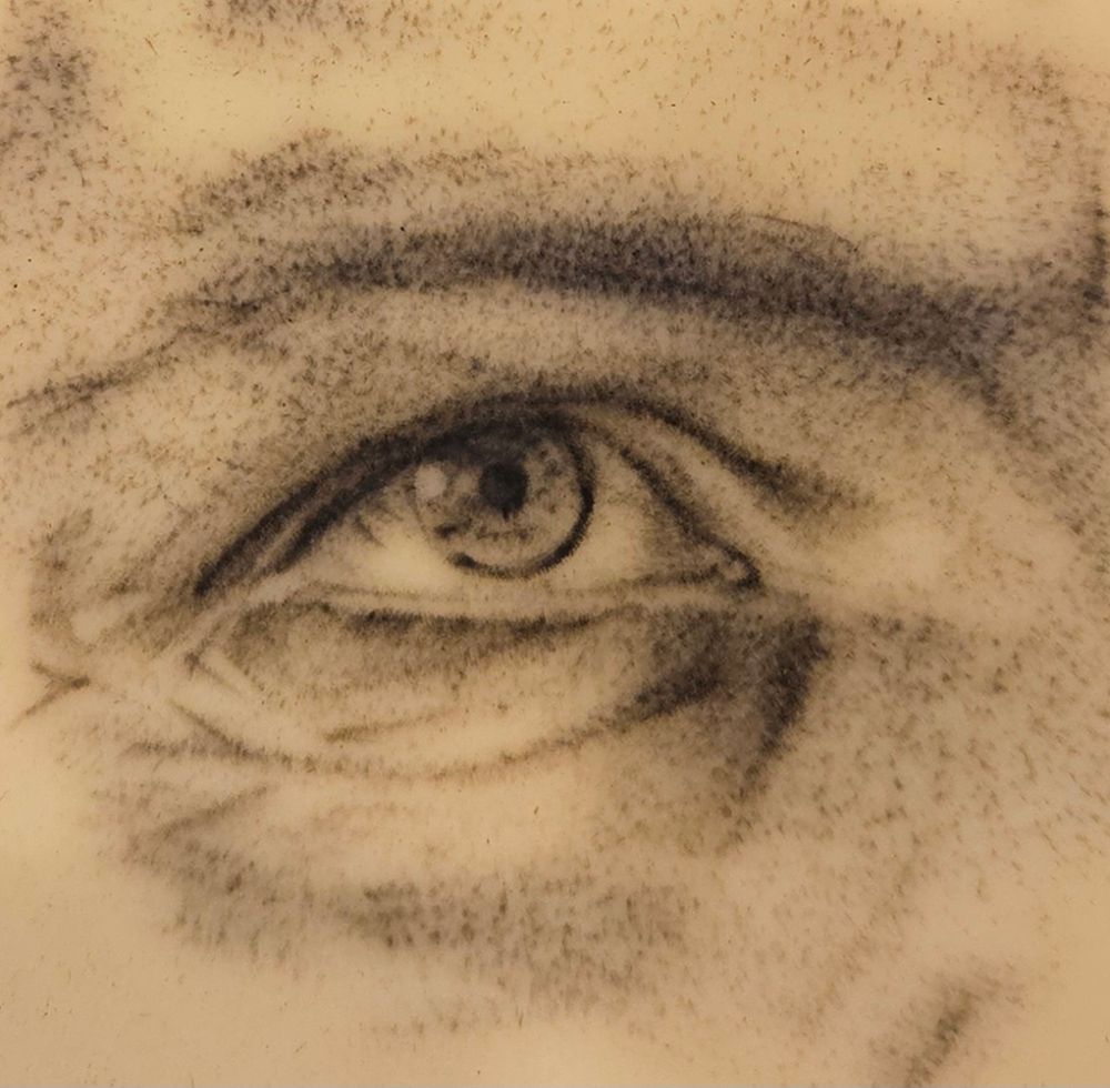 stipple shaded tattoo of kirk's eye done on practice skin with a 3 round liner