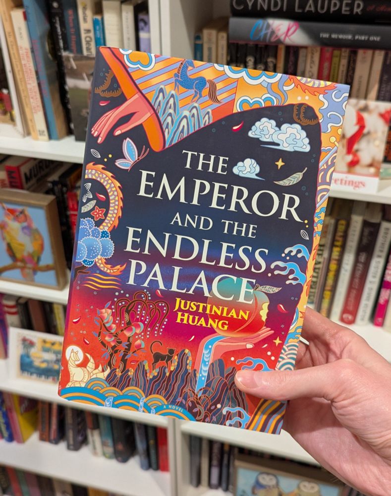 Book cover for The Emperor and the Endless Palace by Justinian Huang. Book jacket features a collage of technicolor, Chinese inspired illustrations and patterns.