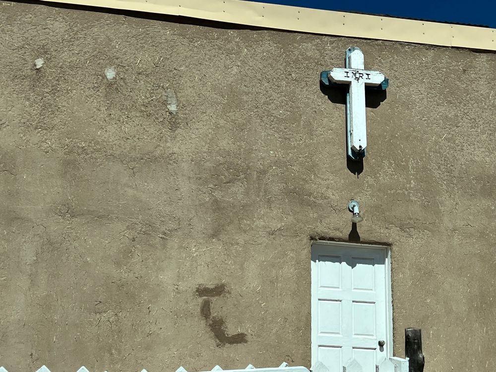Cross on adobe