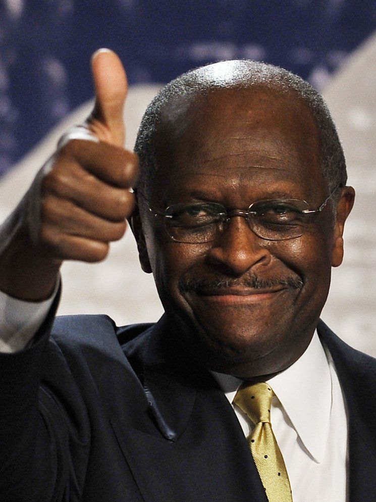 Picture of Herman Cain giving a thumbs up.
