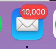 A partial screenshot showing exactly 10,000 unread emails on the Mail app.  A dramatic failure of communication in the modern era.