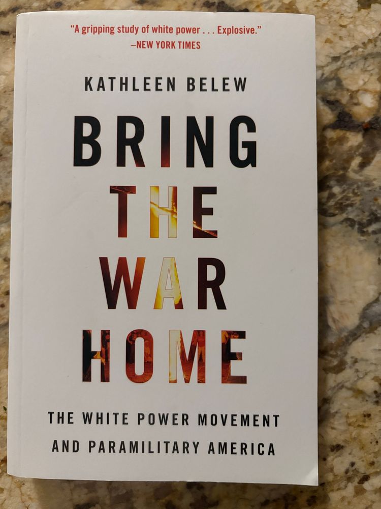 Book cover for the “Bring the War Home: the White Power Movement and Paramilitary America” by Kathleen Belew