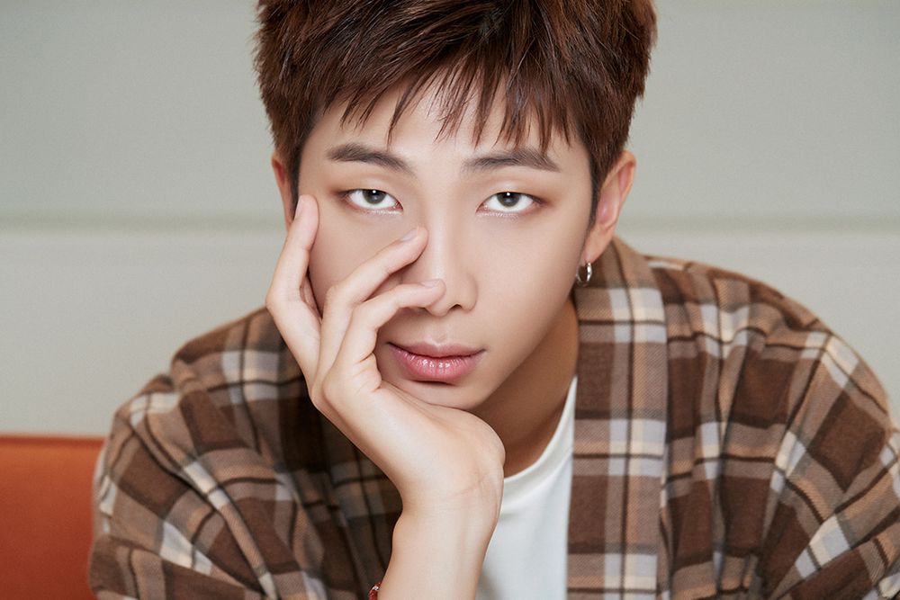 Kim Namjoon, a South Korean man with dragon eyes and a very piercing gaze like he is looking straight into your soul. 