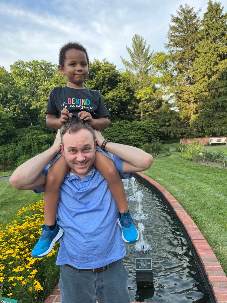 Me with my other nephew on my shoulders. 