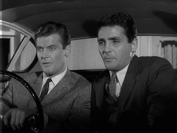 Roger Moore and David Hedison in The Saint