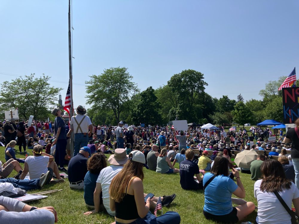 More of the crowd gathered at the Central Park band shell. 